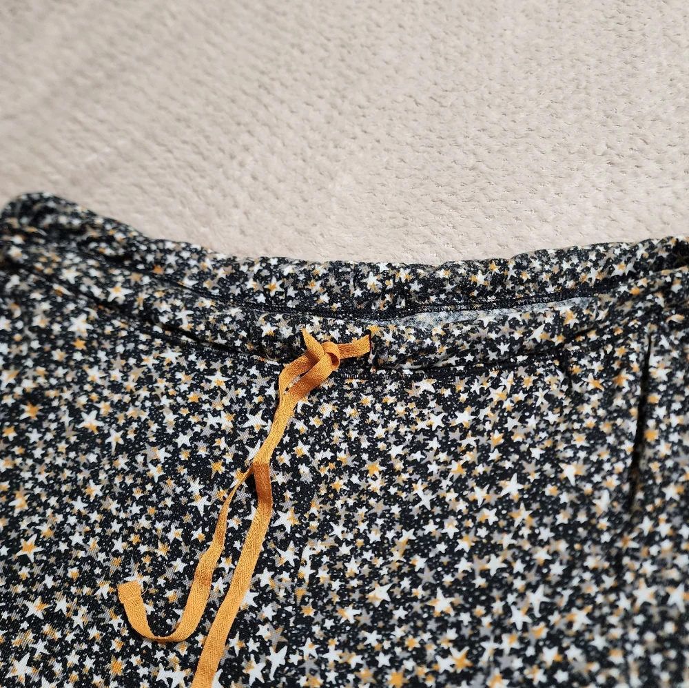 Stylish Black Top with Gold Trim - Picture 3 of 7